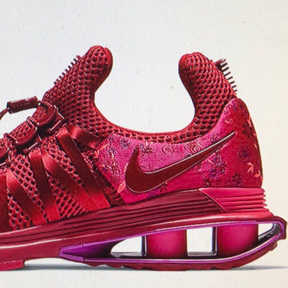 NIKE WOMENS SHOX GRAVITY in RED